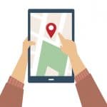 Cartoon image of hand holding tablet with Google Maps symbol