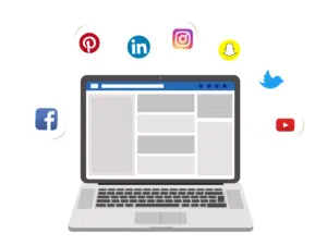 Laptop with Facebook open and social media icons surrounding