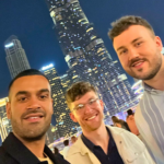 Siren team with Dubai skyline at night
